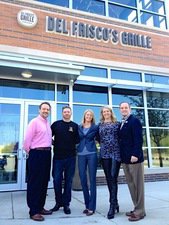 Del Friscos Ceo Mark Mednansky and GM Sabrina Scully stand staff were joined by Southlake Mayor John Terrell at a special sign up rally hosted at Del Friscos Grille in Southlake