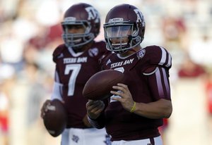 Kenny Hill posted solid numbers in limited action behind Heisman winner Johnny Manziel