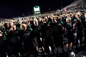 The 2016 Dragons celebrate in the end zone after defeating Cedar Hill 37-33 at Dragon Stadium Photo by SnappedDragonscomS Johnson