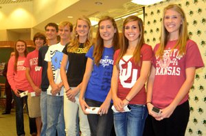 At a special ceremony held today nineteen students including eight members of the State Champion Boys and Girls Cross Country Teams signed their National Letters of Intent 